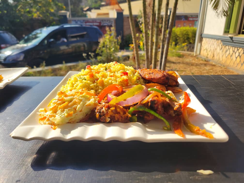 Nigerian fried rice served with protein